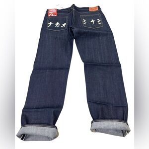 Vtg Evisu raw seldvage Denim with Japanese cream writing on the pockets